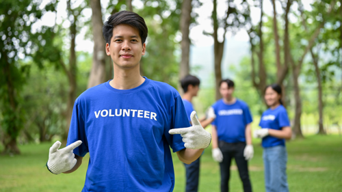 A young man in volunteer uniform