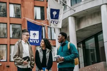 Students standing outside of NYU