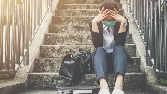 Womansittingonstairswithheaddown_2023
