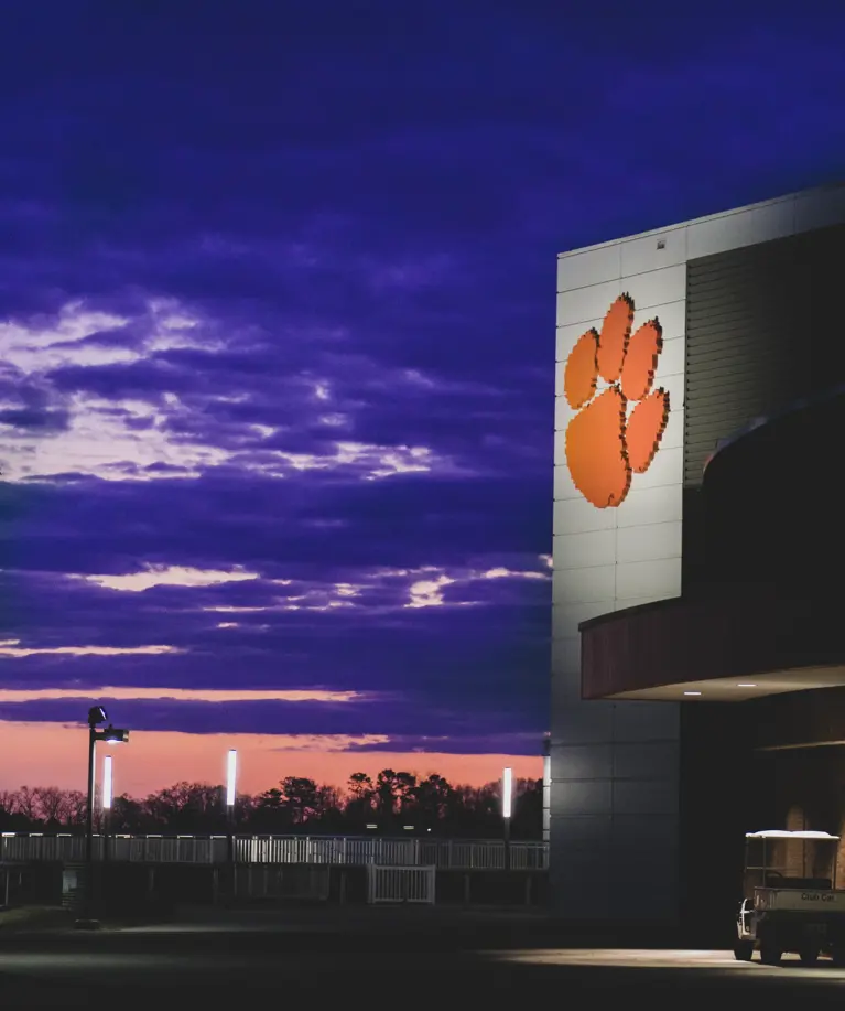 Clemsonlogobuildingsunset_2023